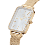 Daniel Wellington Quadro Lumine Bezel Evergold MOP analog damklocka med vit urtavla och armband i rostfritt stål