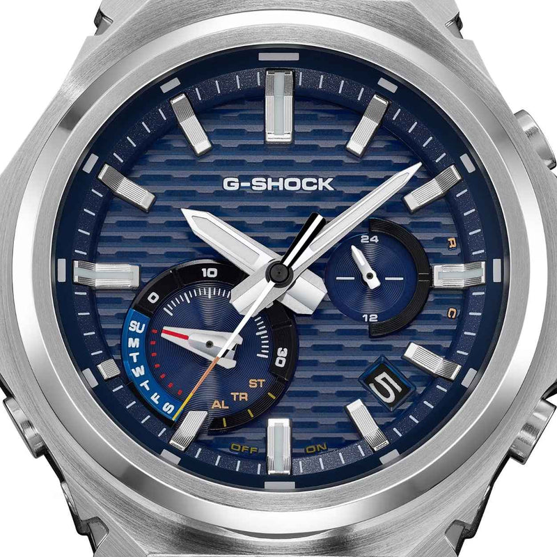 Casio G-Shock GST-B1000D-2AER analog herrklocka med blå urtavla och armband i rostfritt stål